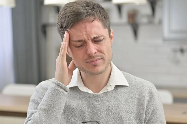 man-feeling-pain-in-the-head